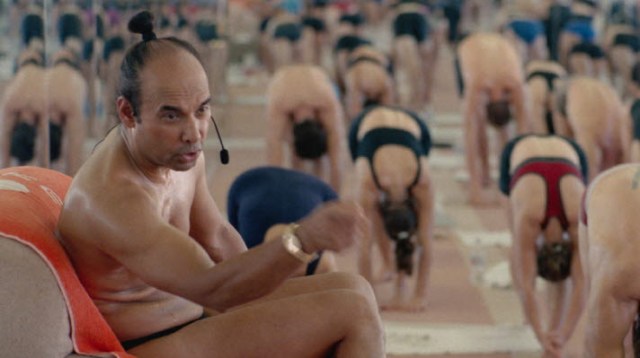 Bikram: Yogi, Guru, Predator_Bikram instructs his students.